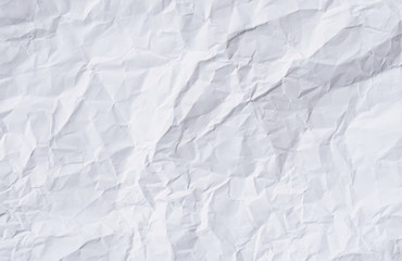 White crumpled paper texture background.