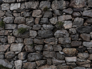 Stone aged brick wall texture background