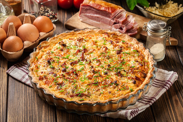 Homemade quiche lorraine with bacon and cheese - 297065844