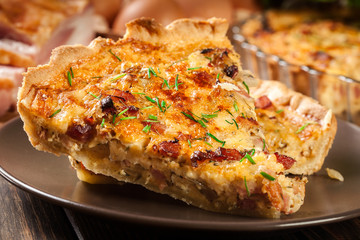 Pieces of quiche lorraine with bacon and cheese