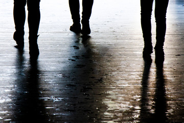 Blurry shadow silhouette of a people walking in the night, detail - 297070848