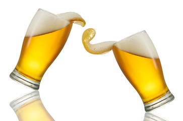 Beer splash in glass isolated on white