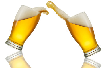 Beer splash in glass isolated on white