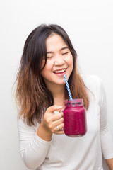 Beautiful women drinking fresh smoothies fruit