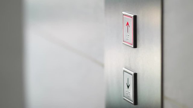 Finger Pressing Elevator Button Up in Office Center or Hotel. Progress Future Startup Concept Footage. 4K Slowmotion.