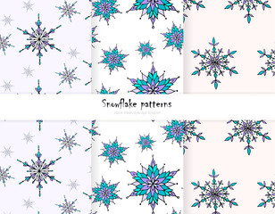 Set of Christmas vector patterns with hand drawn snowflakes. Festive winter patterns. Eps 10 vector illustration.