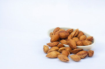 almonds isolated on white background close up. 