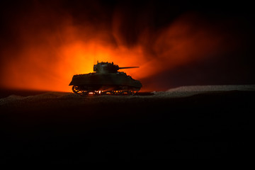 War Concept. Military silhouettes fighting scene on war fog sky background, Silhouette of armored...