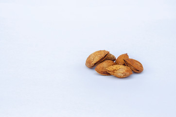 almonds isolated on white background close up. 