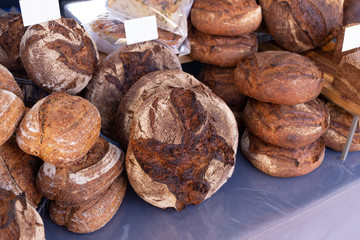 Freshly baked rye granary bread on a food market stall