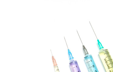 Drug combination therapy for synergistic effect. Syringes on the white background