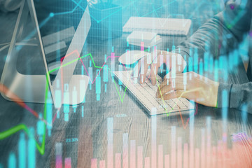 Double exposure of financial graph with man works in office on background. Concept of analysis.