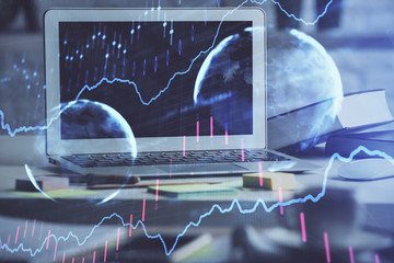 Stock market graph and table with computer background. Multi exposure. Concept of financial analysis.