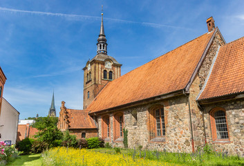 Fototapeta na wymiar Johanniskirche church and garden in Flensburg, Germany