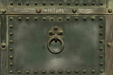 old metal knocker on church door, no entry