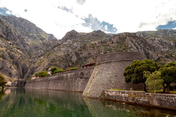Fototapeta na wymiar Fortress on the river in Montenegro, Kotor