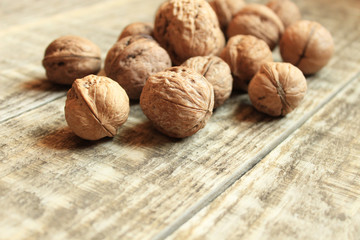 Walnuts close-up on a wooden background