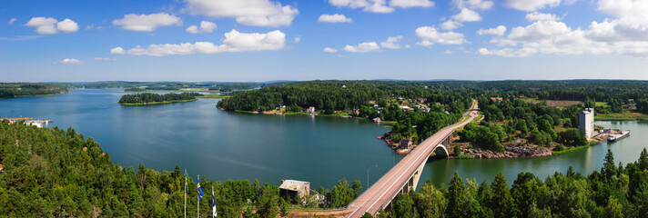 An aerial panoramic shot of a bridge in the archipelago of Åland