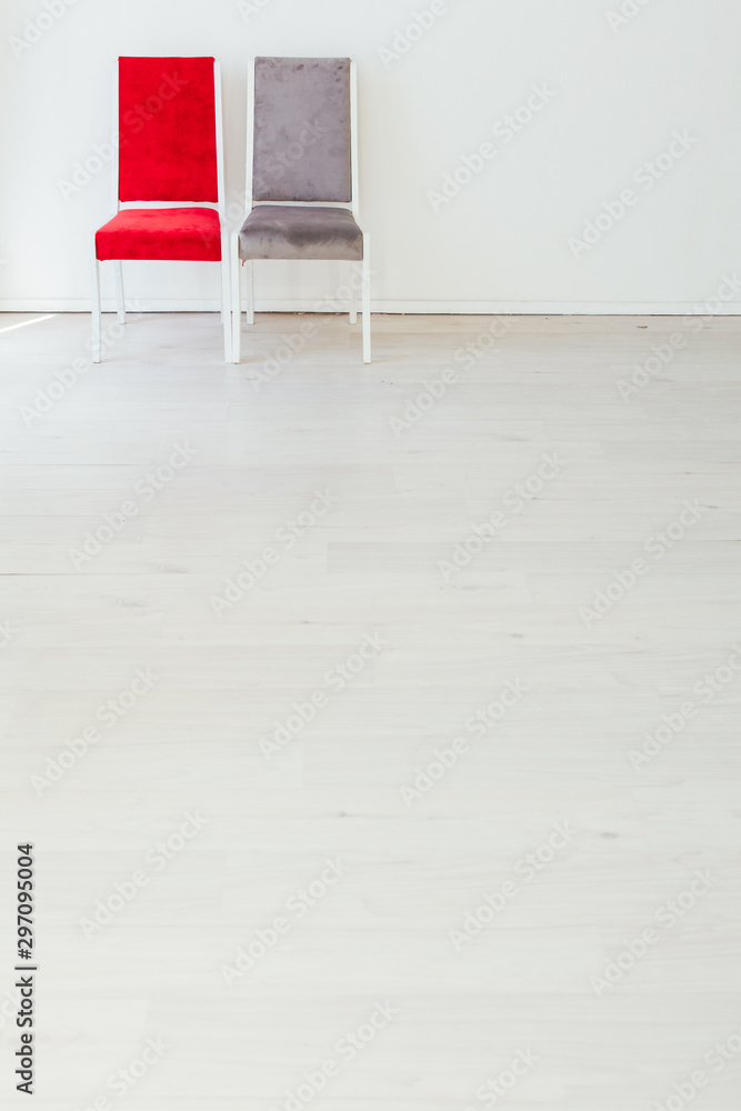 Wall mural two chairs in the interior of an empty white room