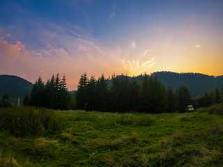 Plakat Landscape with Carpathian mountains during the sunset with amazing sunlight