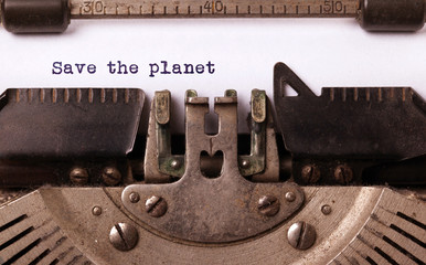 Save the planet, written on an old typewriter