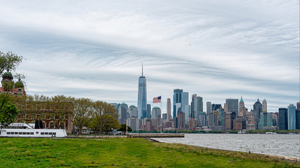 Manhattan , Ellis Island and a ferry boat