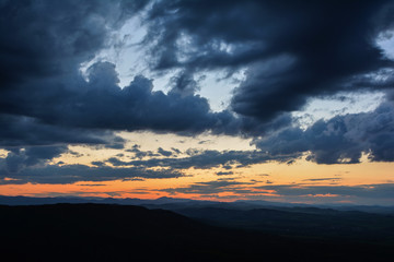 Dramatic dark cloudy sky over over the Vitosha mountain near Sofia, Bulgaria. View from the Kopitoto Hill