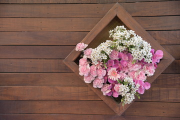 Flower bouquet on the wall.