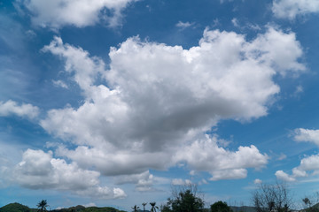 Obraz premium A big, white cloud on the blue sky