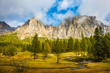  The rocks surround the grassy valleys