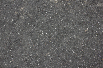Textured Background of Small Stones and Sand from Mount Etna. The island of Sicily, Italy.