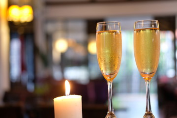 glasses of champagne on table in restaurant