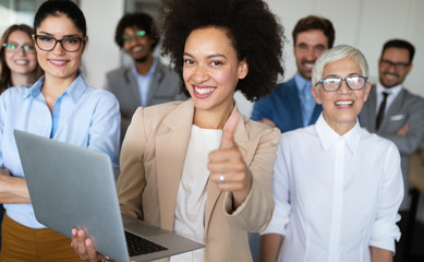 Group of successful business people in office