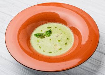 mushroom cream soup on white wooden board