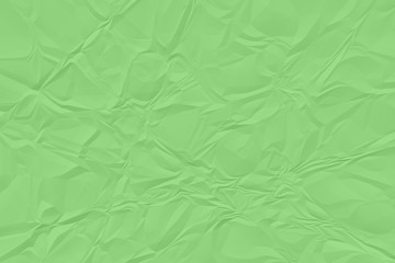 crumpled green paper background close up