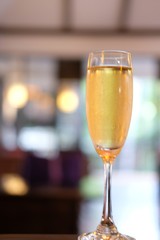close up glass of champagne on bar counter