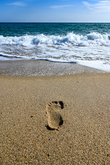foot print on a sandy beach in Spain