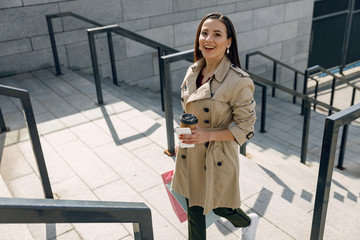 Amazing brunette woman walking after working day