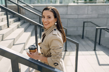 Positive delighted young female person walking after work