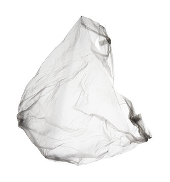 flying transparent used polyethylene bag isolated on white background
