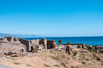 Fototapeta na wymiar Ruins of Anamurium Ancient City Theater in Anamur Town, Turkey