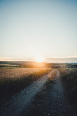 Road in the middle of nowhere during sunset