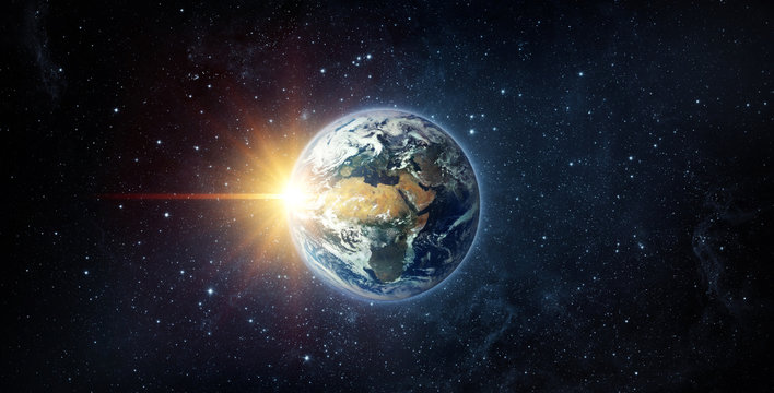 Panoramic view of the Earth, sun, star and galaxy. Sunrise over planet Earth, view from space. Elements of this image furnished by NASA.