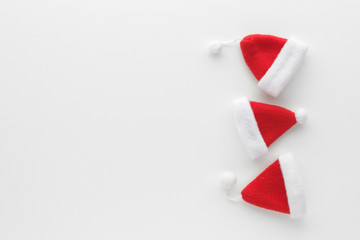 Christmas composition. Santa hat top view background with copy space for your text. Flat lay.