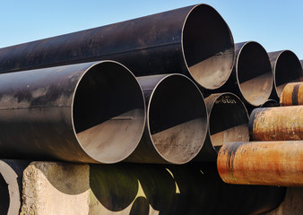 Images of natural gas transportation equipment, including large diameter and high pressure pipes,...