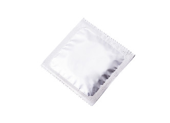 Close up of a condom on white background