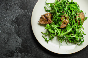 healthy salad with liver (tasty appetizer) menu concept. food background. copy space. Top view