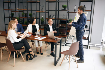 cheerful motivated man gaving recommendations, advise to run startup business, discussion, workshop