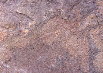 seamless background texture of natural raw stone brown granite
