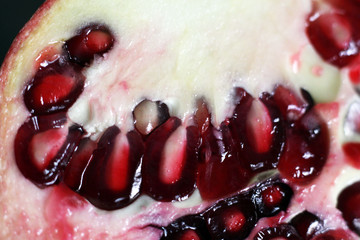 Red ripe pomegranate seeds so close, food